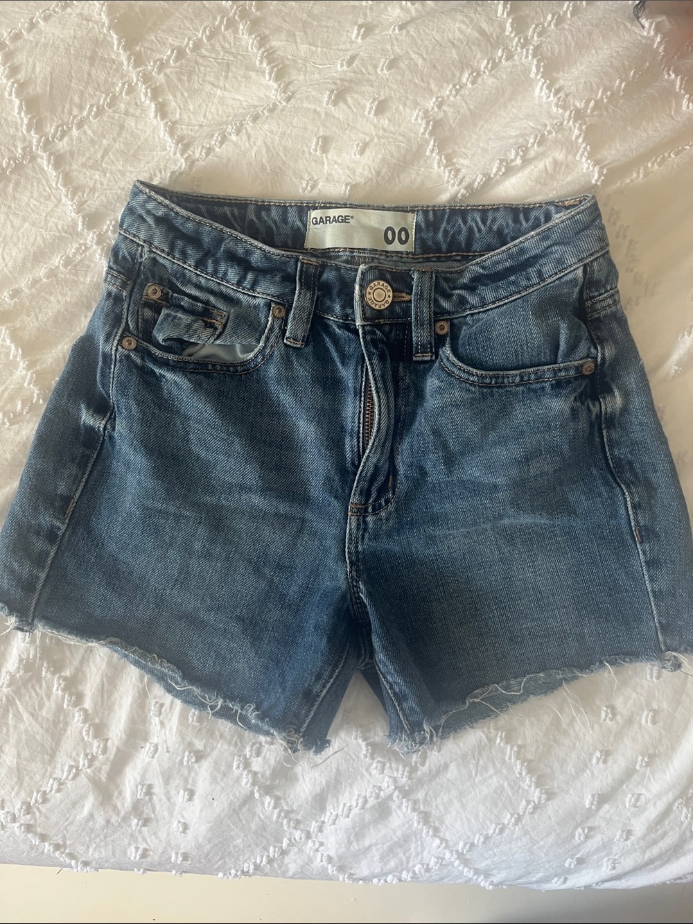 Garage Women's Medium Wash Denim Cutoff Shorts